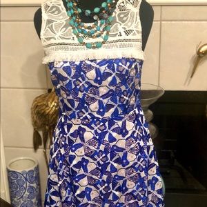 Wow! Who is she in that gorgeous dress?